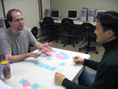 adult student practicing with the instructor