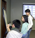 teen students working on a class activity together