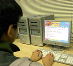 teen student working on the computer exercises